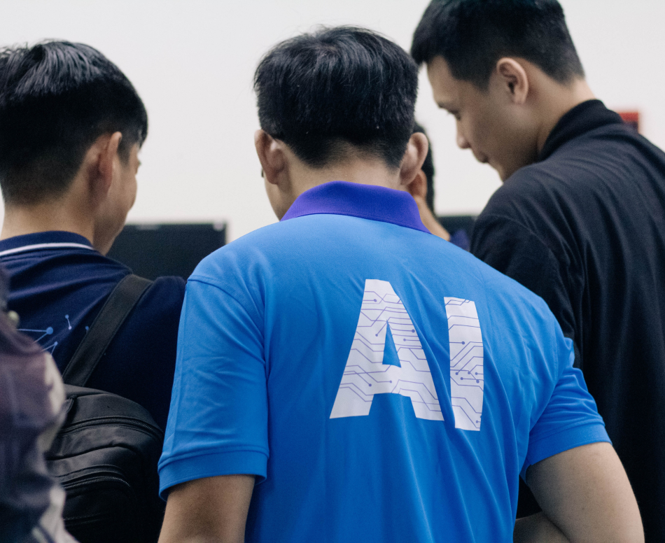 People grouped up with a person with a blue with white text "AI"